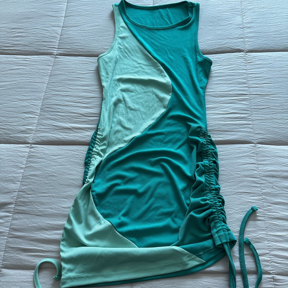 Two tone green mini dress with rouche detail on both sides
